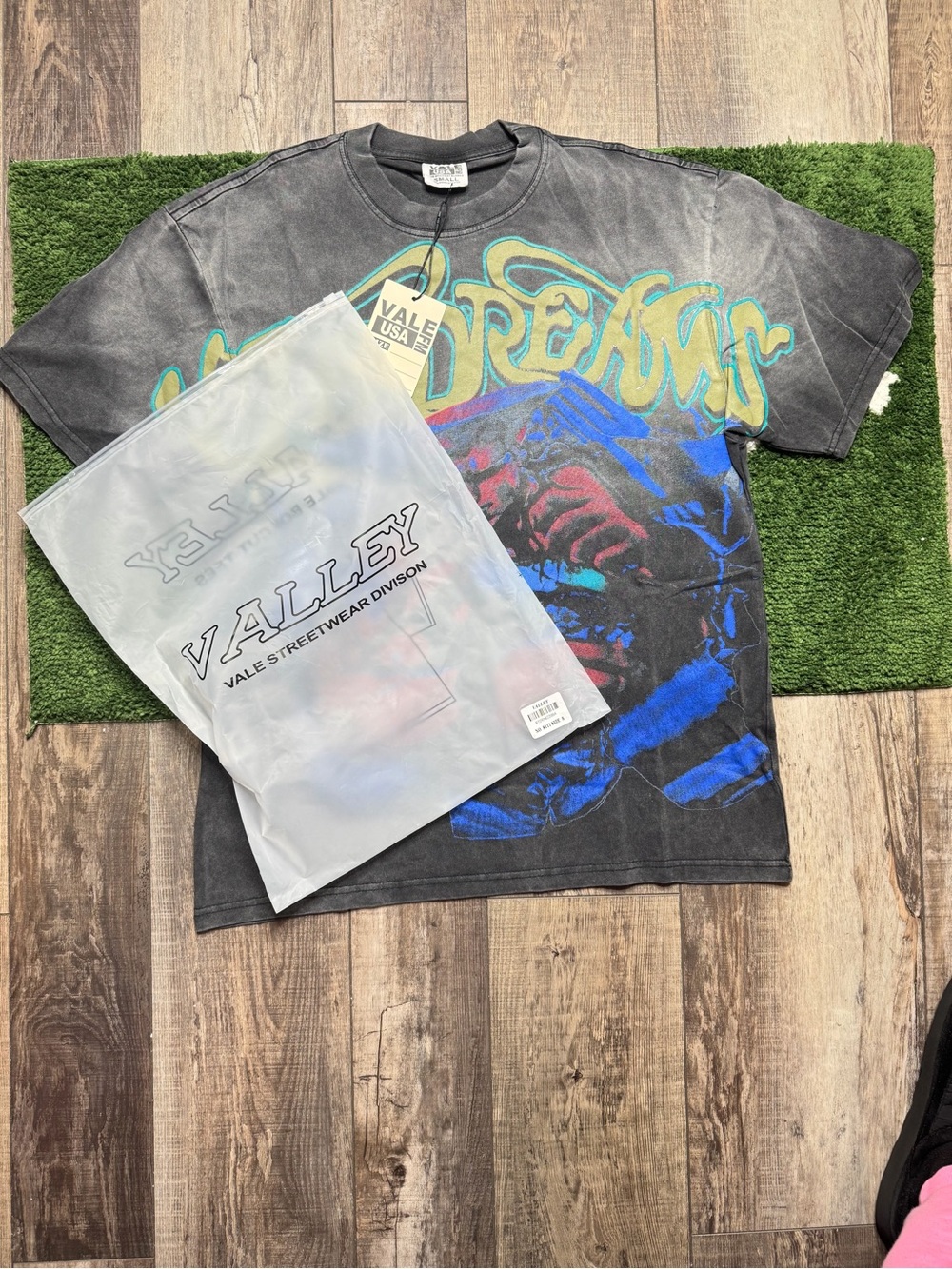 Black Short-Sleeve Graphic Vale Tee with Blue & Yellow Print